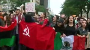 Communist and Mexican flags at Nov. 9, 2016 Austin, TX protests against Trump victory.